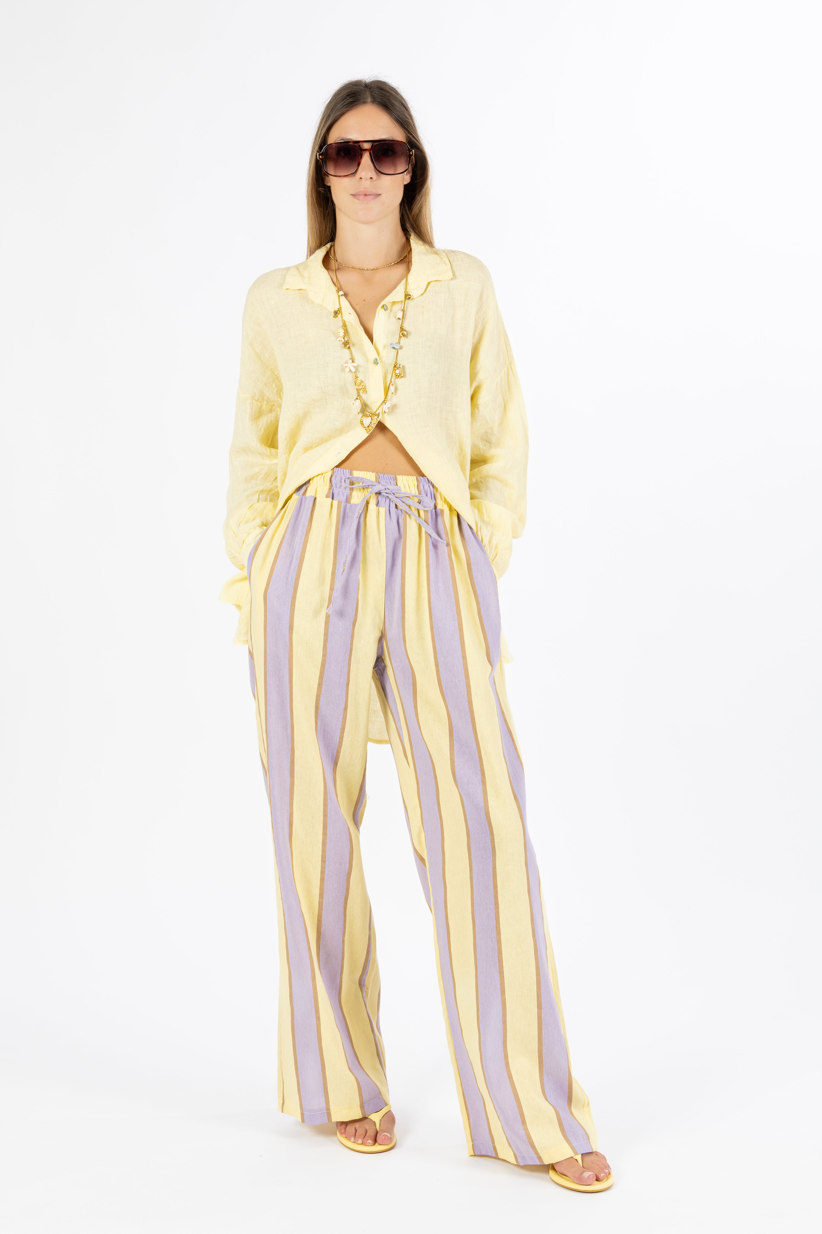 Pantalone a righe giallo e lilla