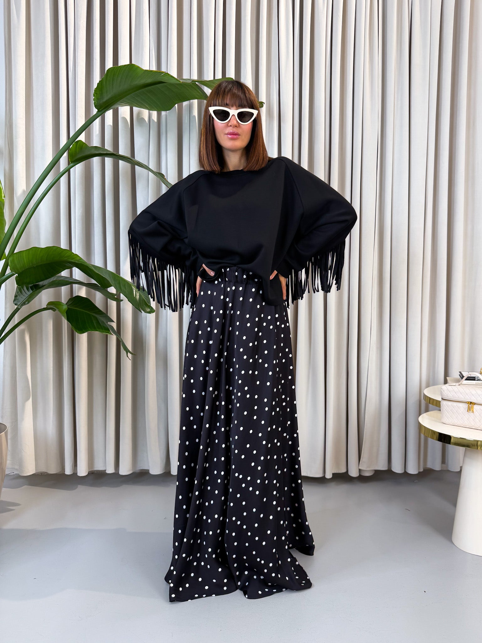 Felpa nera con frange