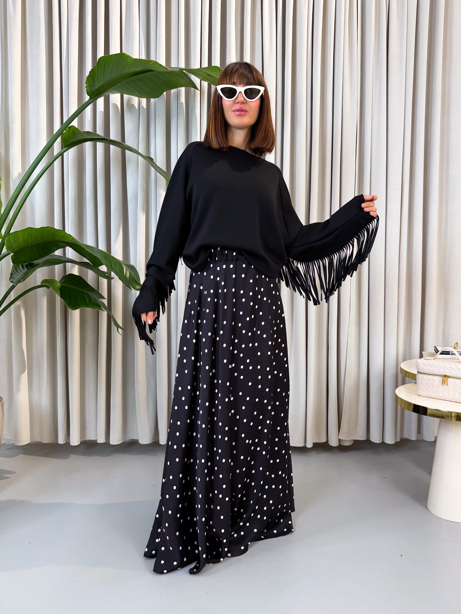 Felpa nera con frange