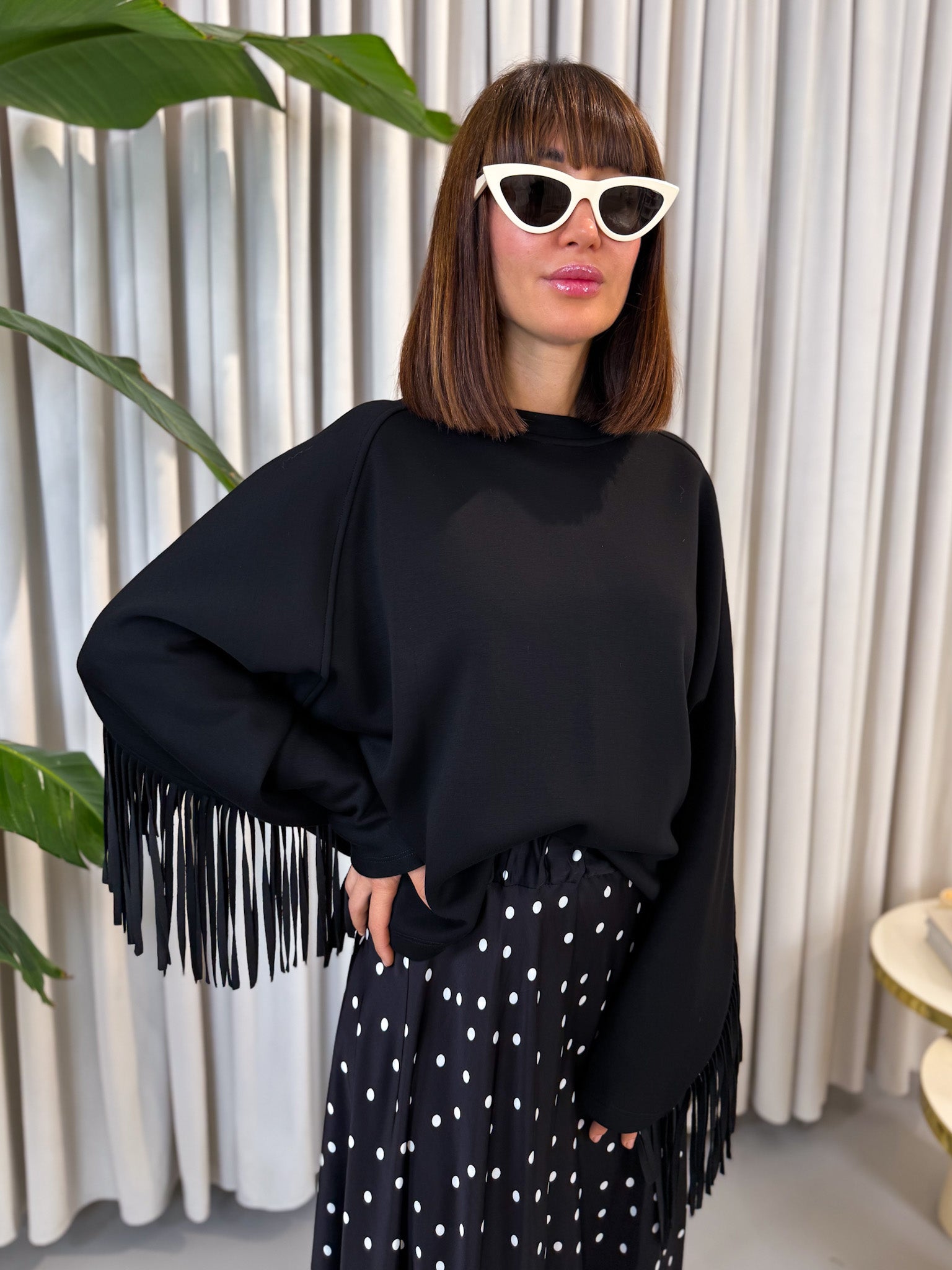 Felpa nera con frange