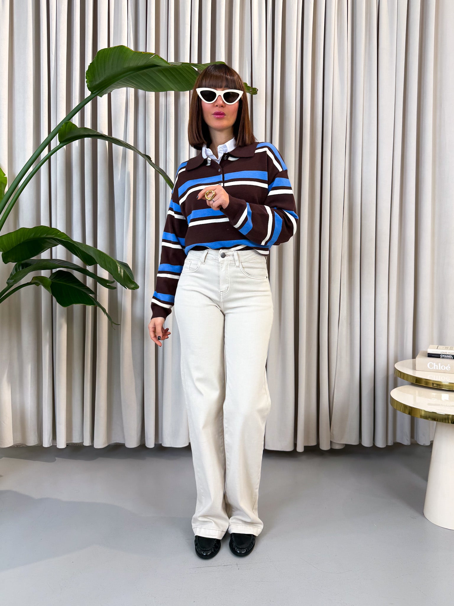 Pullover polo a righe azzurre