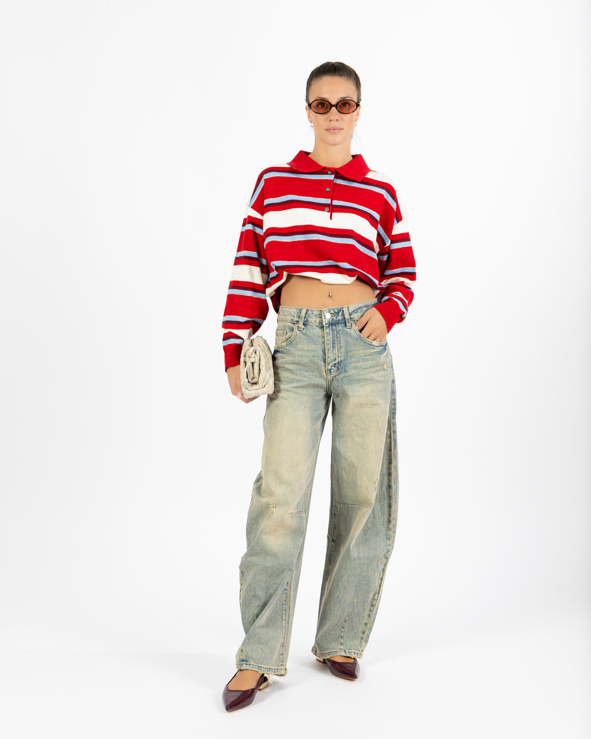 Polo a righe rosso e azzurro