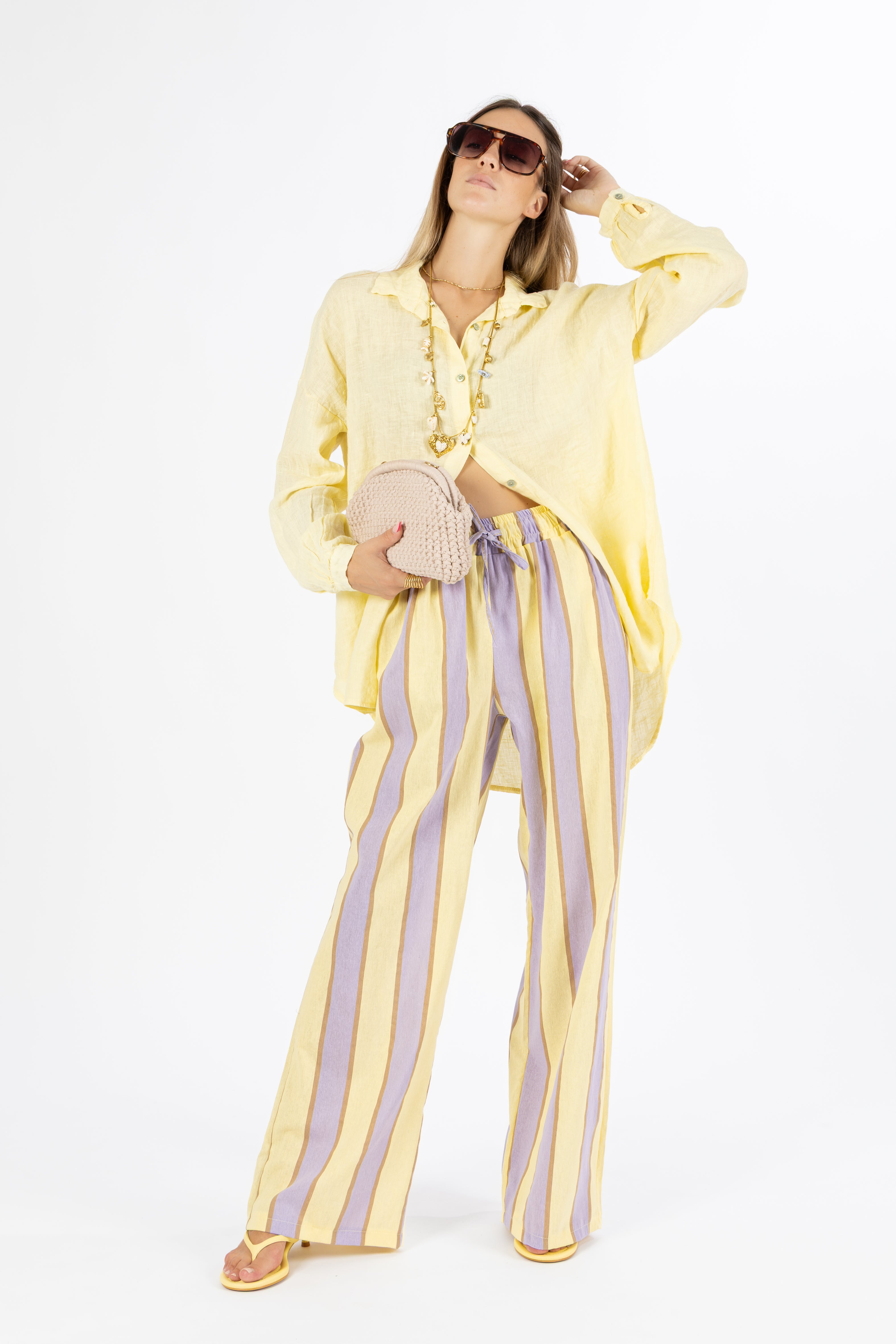 Pantalone a righe giallo e lilla