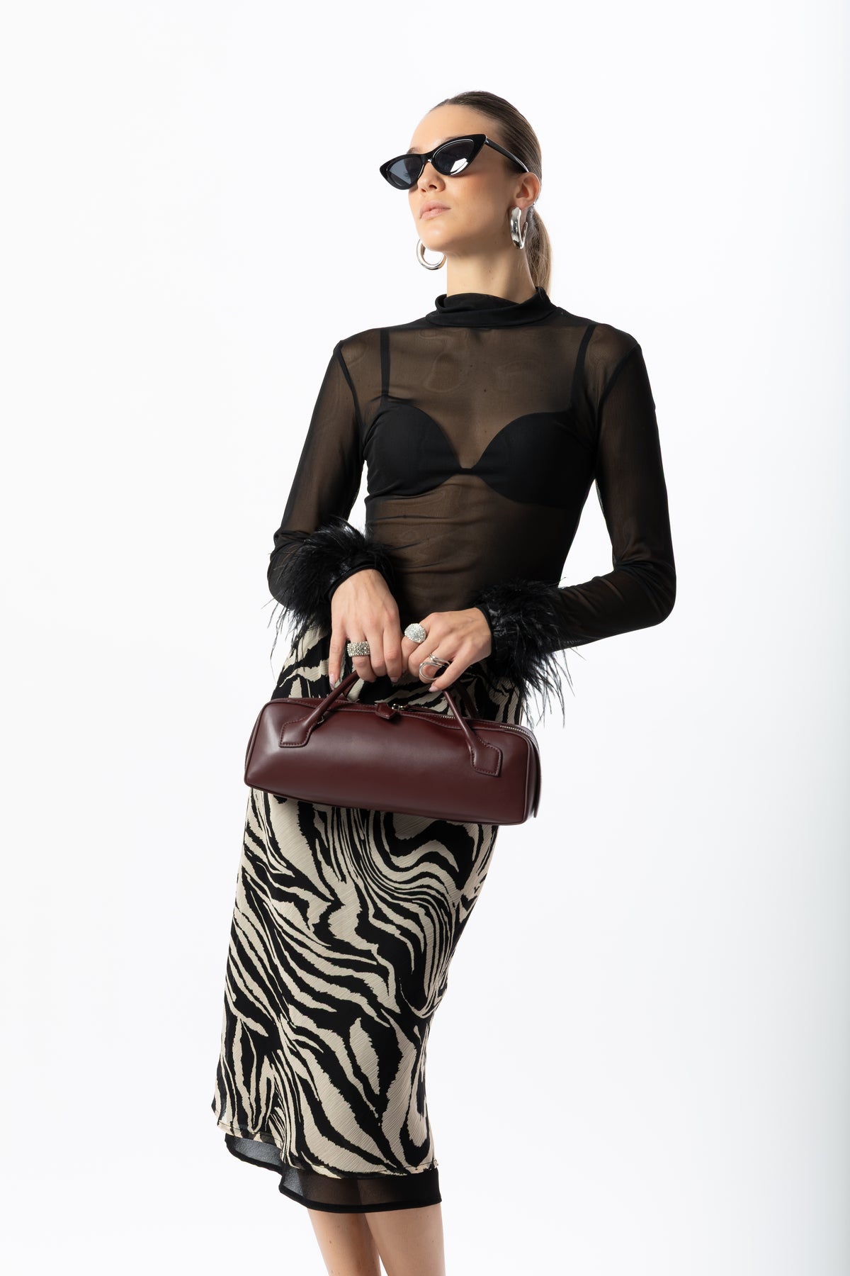 Maglia in tulle e piume