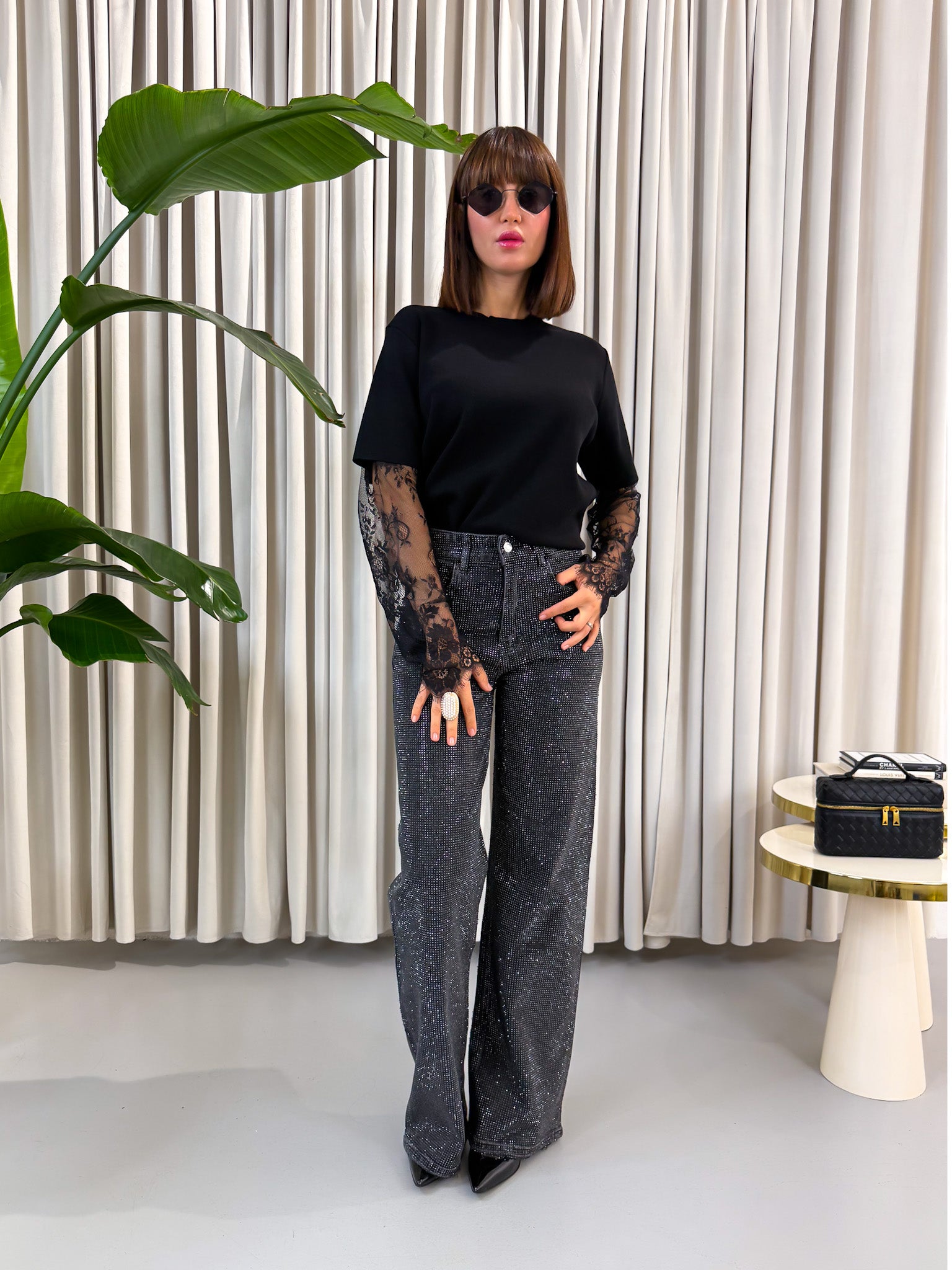 Pullover con pizzo nero