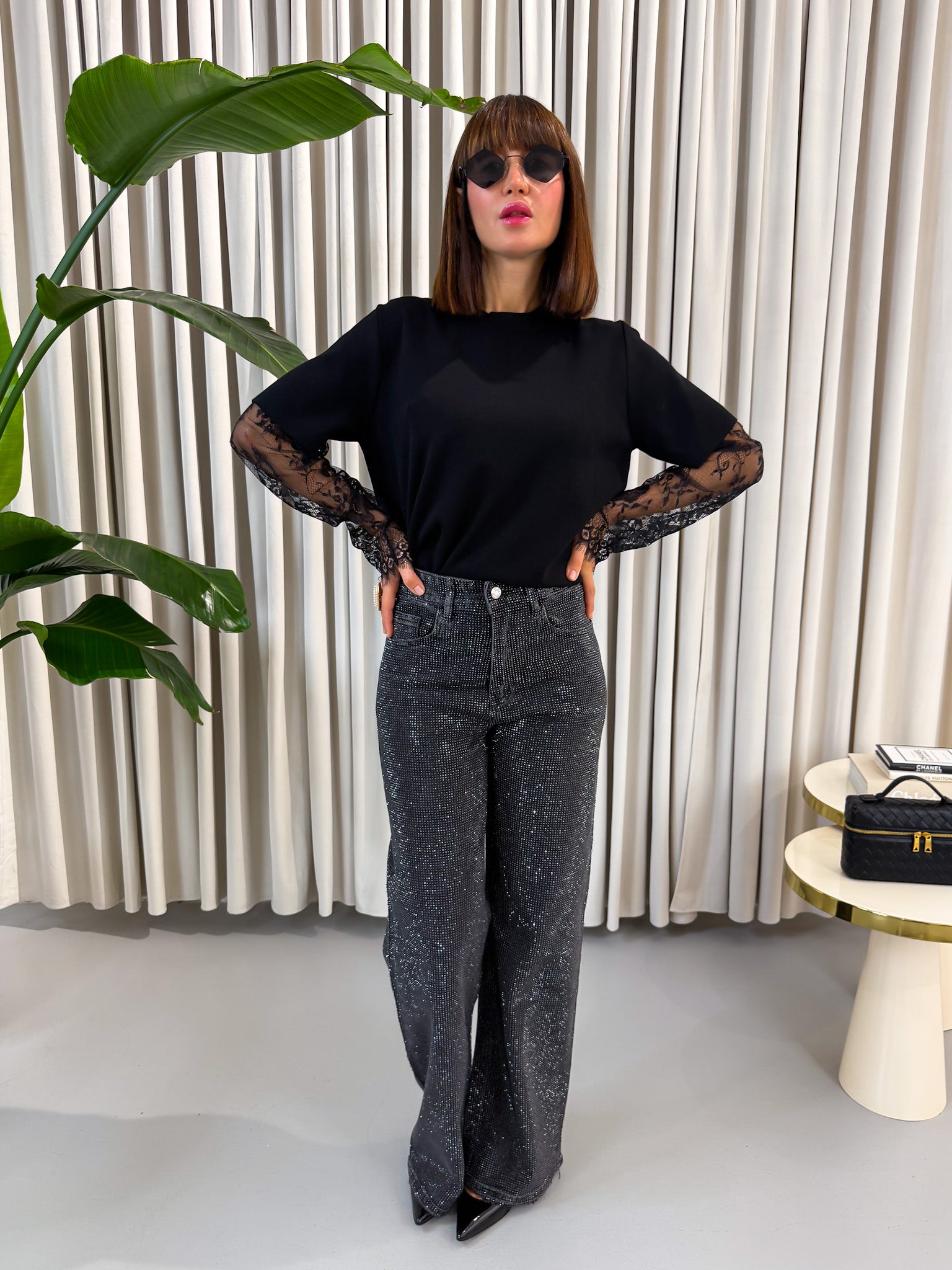 Pullover con pizzo nero