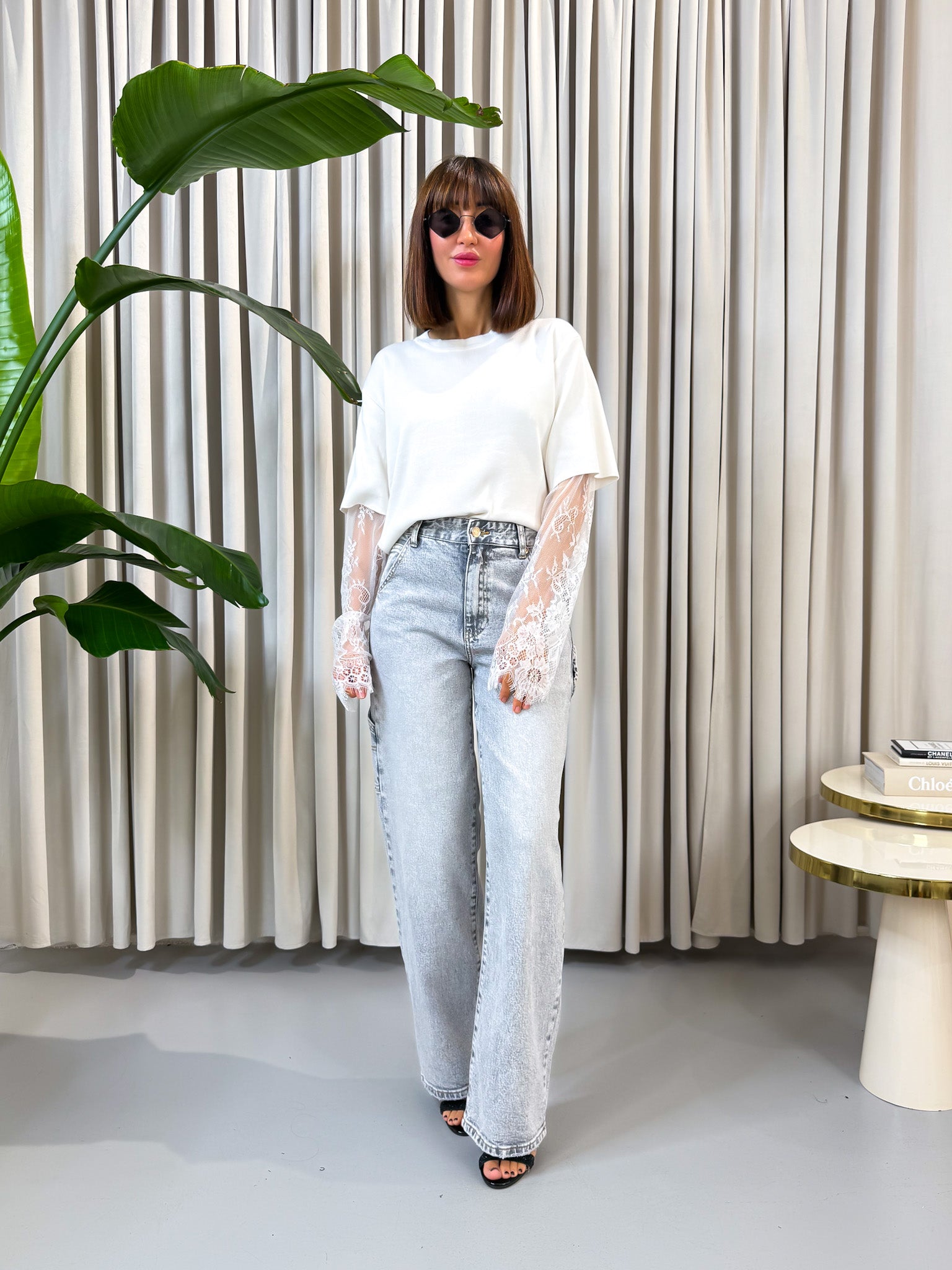Pullover con pizzo bianco