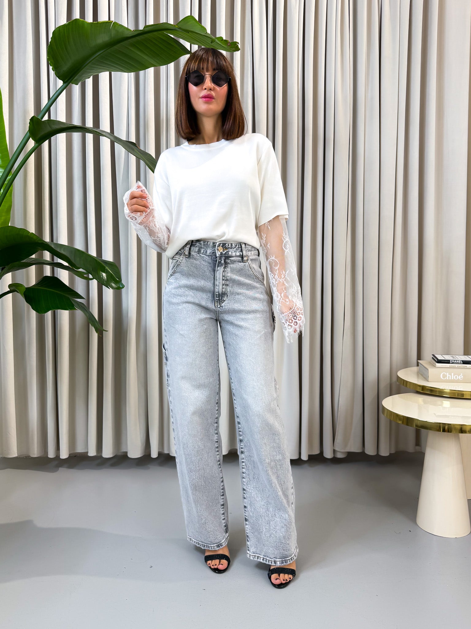 Pullover con pizzo bianco