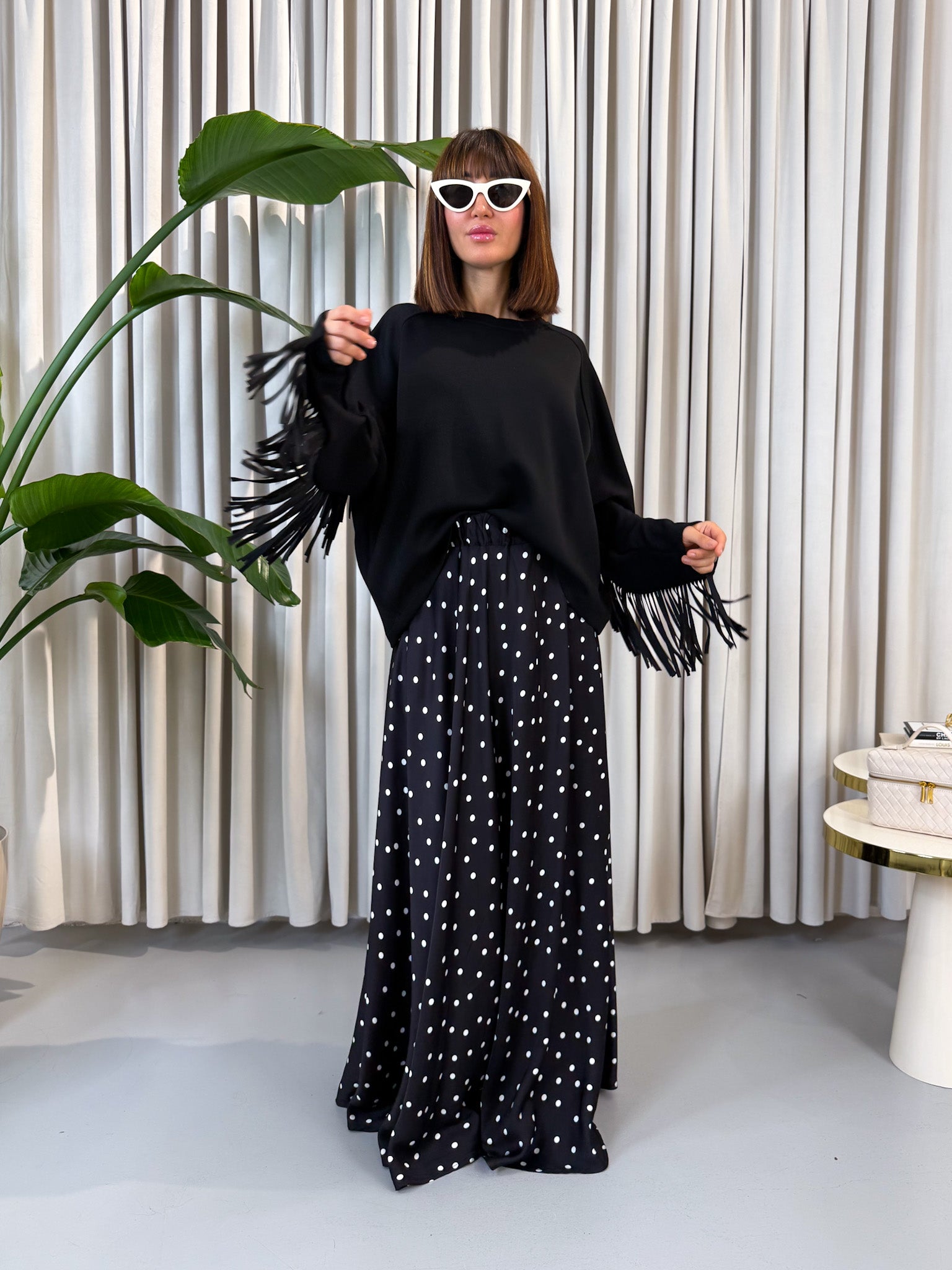 Felpa nera con frange