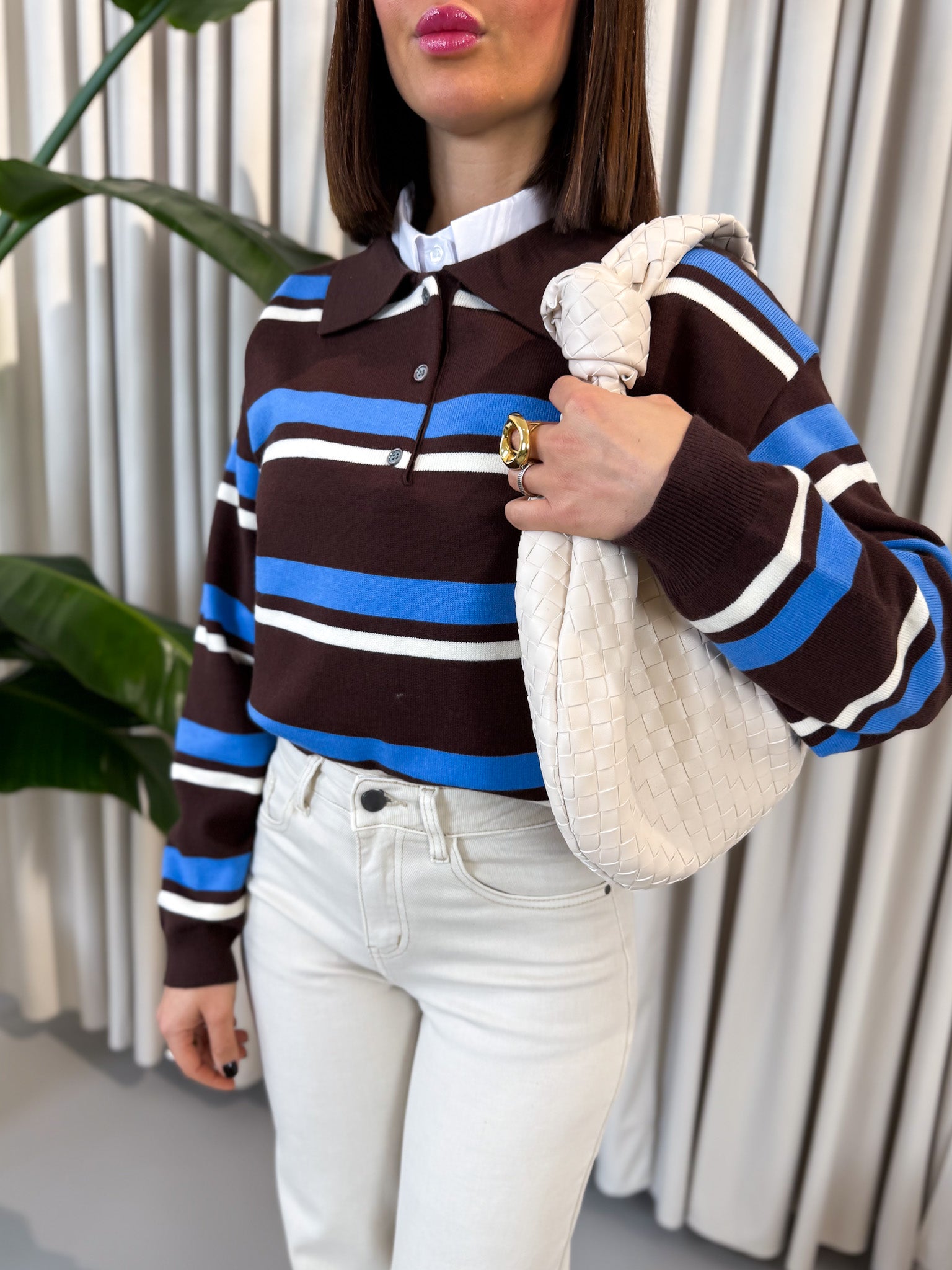 Pullover polo a righe azzurre